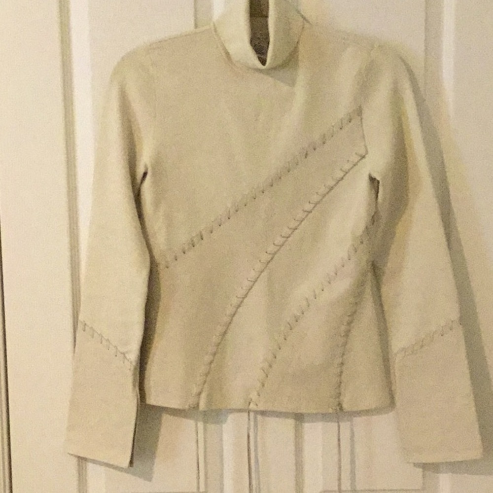 Cache cream colored turtleneck with leather trimming.
